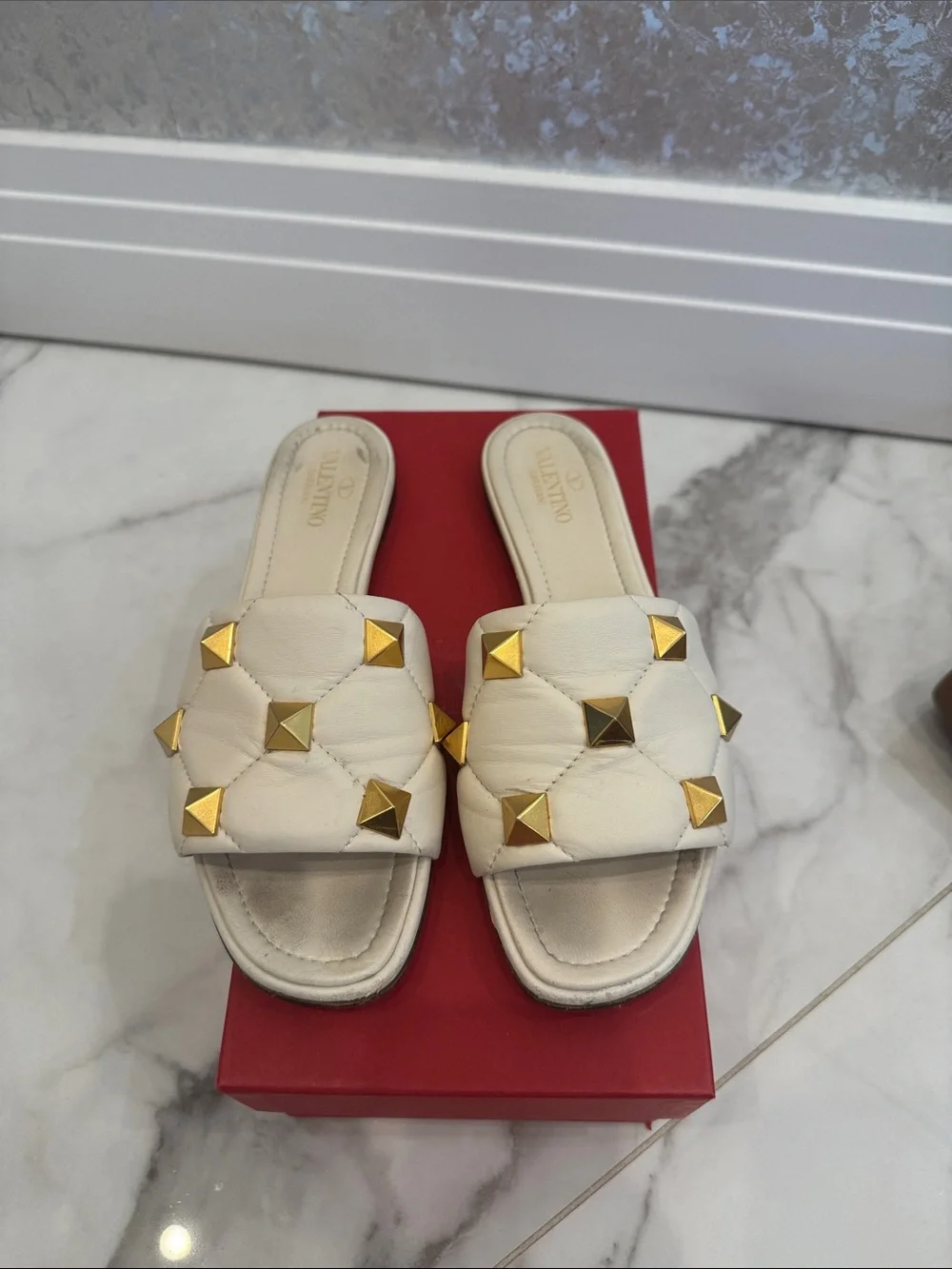 Valentino Garavani Ivory Slide Sandals with Gold Pyramid Studs - Picture 2 of 3